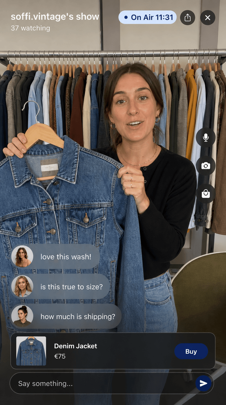 A seller on air in Airvailable, holding up a denim jacket while viewers ask questions in chat and a Buy button sits under the item